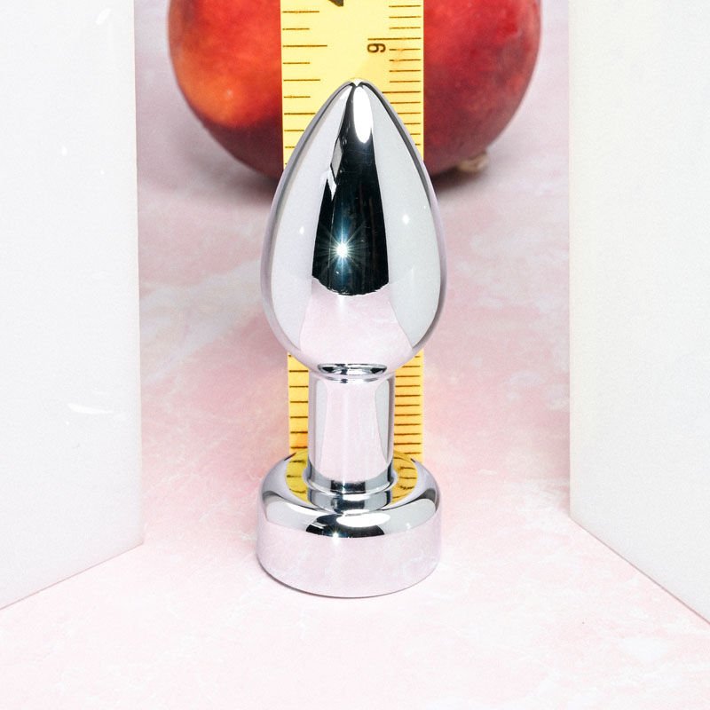 Gender x - rockin' metal vibrating butt plug - Product front view, with sizes  | Flirtybay.com.au